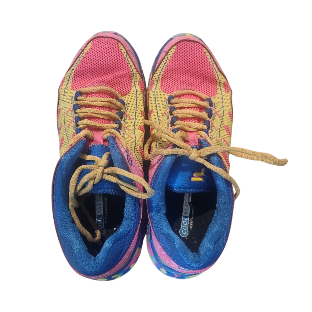 Fila multi color tennis shoe. Pink, yellow, and blue. Great tread. Yellow laces